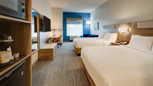 A hotel room with two beds, a kitchenette, a television, and a seating area. - Holiday Inn Express Leland - Wilmington Area by IHG (Leland)