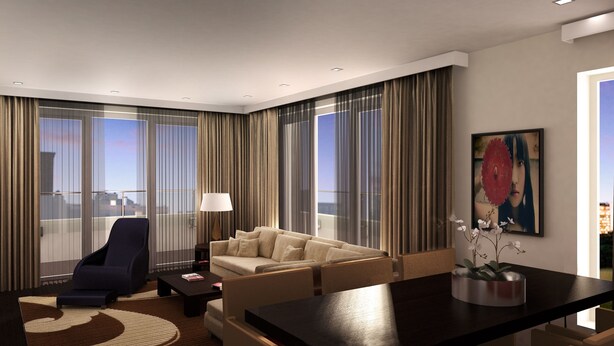 A modern hotel room with a large window, a sofa, a chair, a coffee table, and a painting on the wall. - Atelier EC1 by Bridgestreet (London)