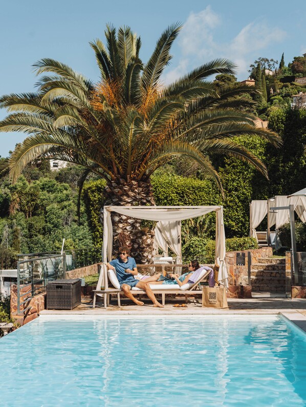 Outdoor pool, pool umbrellas, pool loungers