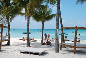 On the beach, beach massages, beach bar