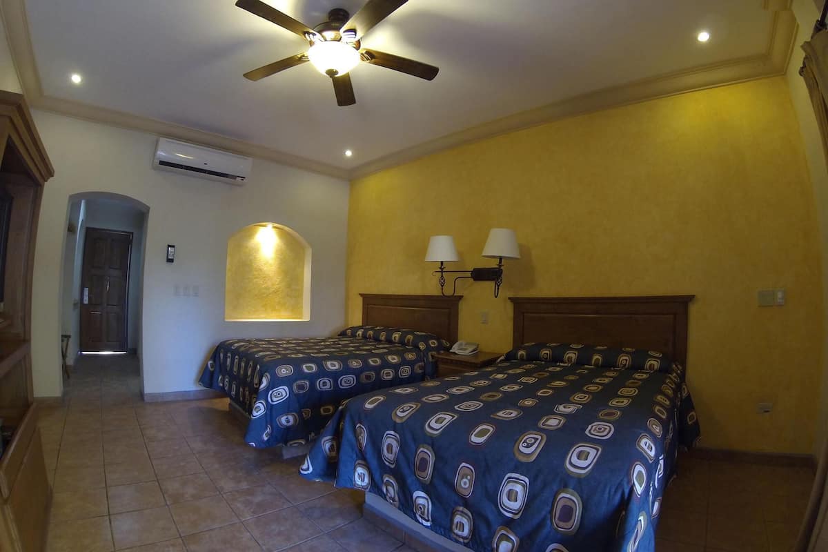 Desk, blackout drapes, iron/ironing board, bed sheets