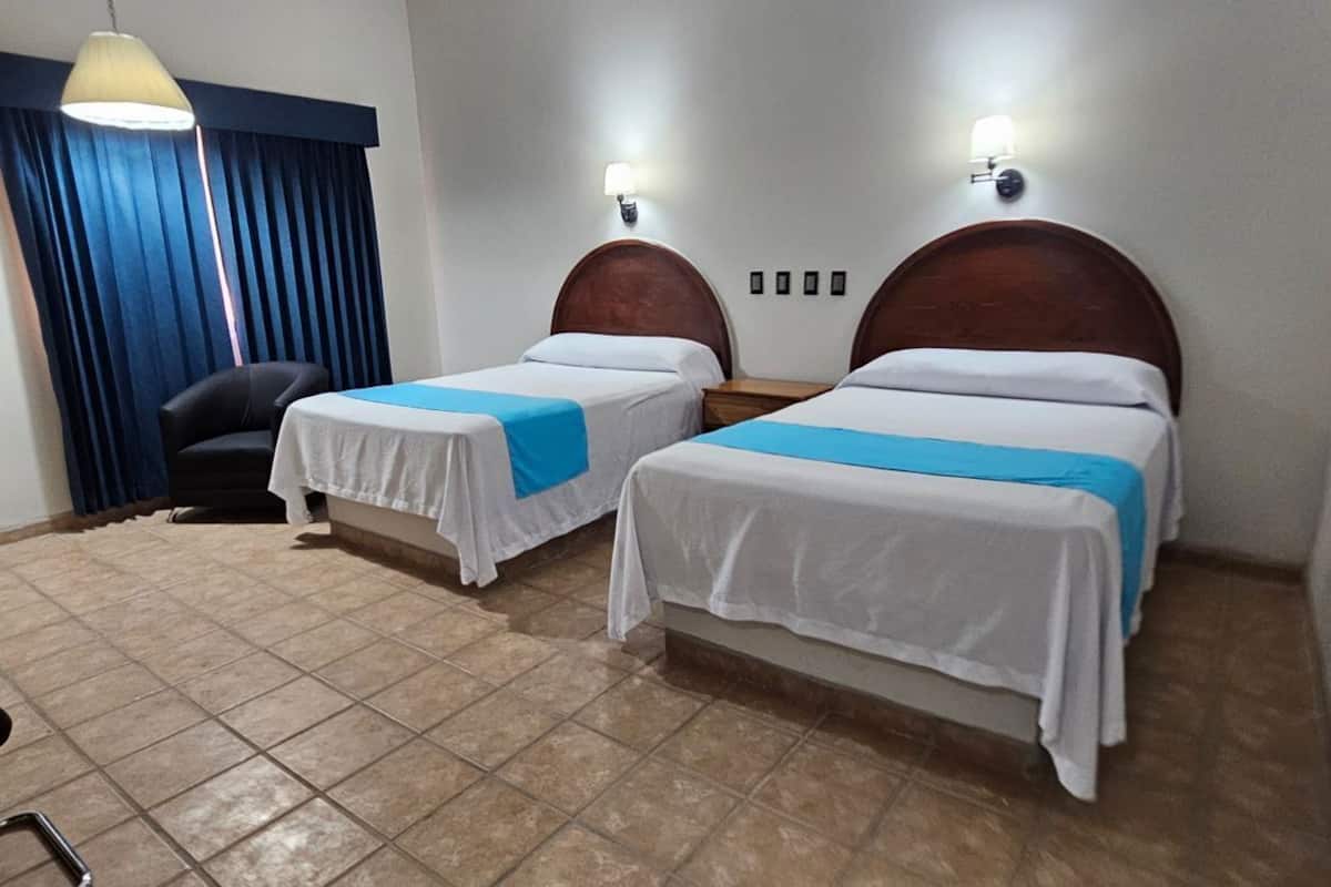 standard suite | desk, blackout curtains, iron/ironing board, bed sheets