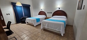 Standard Suite | Desk, blackout drapes, iron/ironing board, bed sheets - Hacienda Suites Loreto (Loreto)