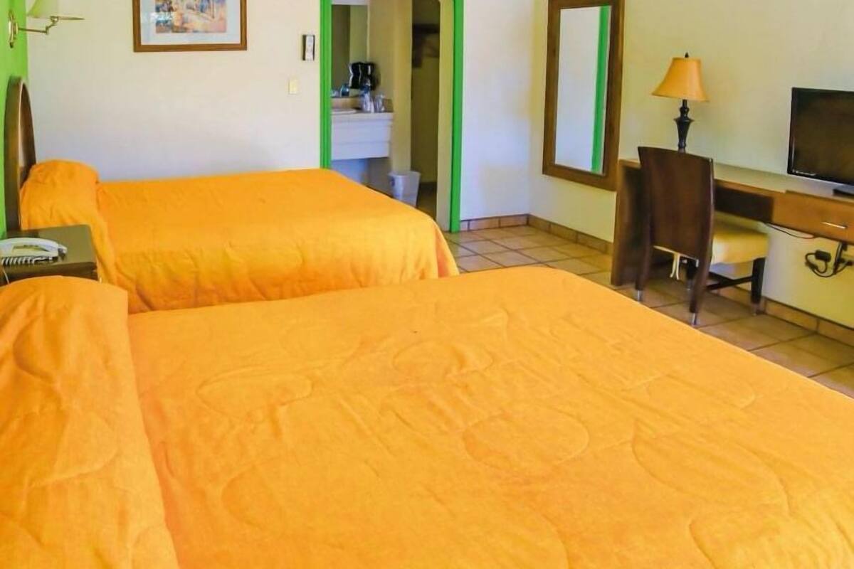 standard suite | desk, blackout curtains, iron/ironing board, bed sheets