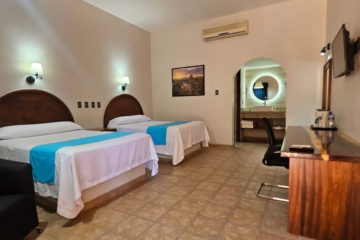 standard suite | desk, blackout curtains, iron/ironing board, bed sheets