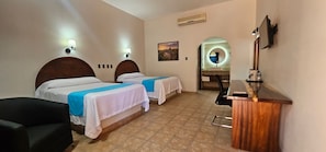 Standard Suite | Desk, blackout curtains, iron/ironing board, bed sheets - Hacienda Suites Loreto (Loreto)
