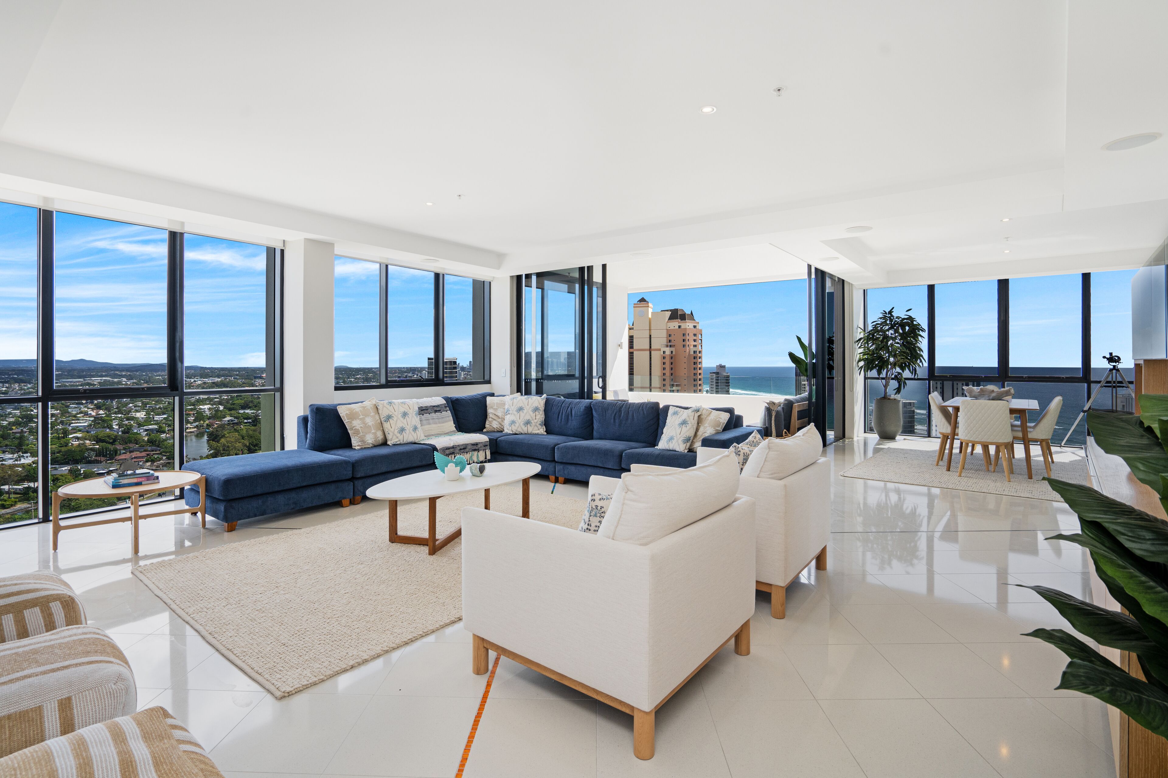 4 bedroom sub penthouse - ocean views | living area | 55-inch flat-screen tv with satellite channels, tv, dvd player