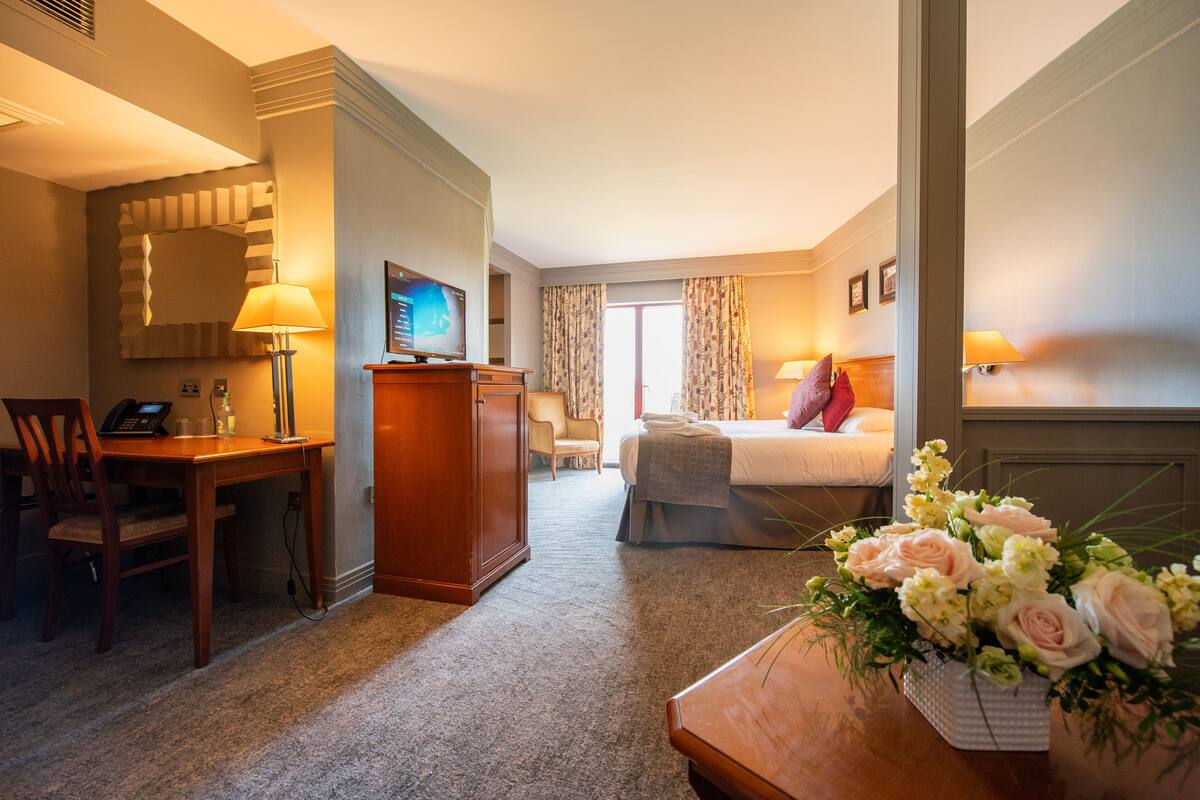 junior suite | in-room safe, desk, blackout curtains, soundproofing