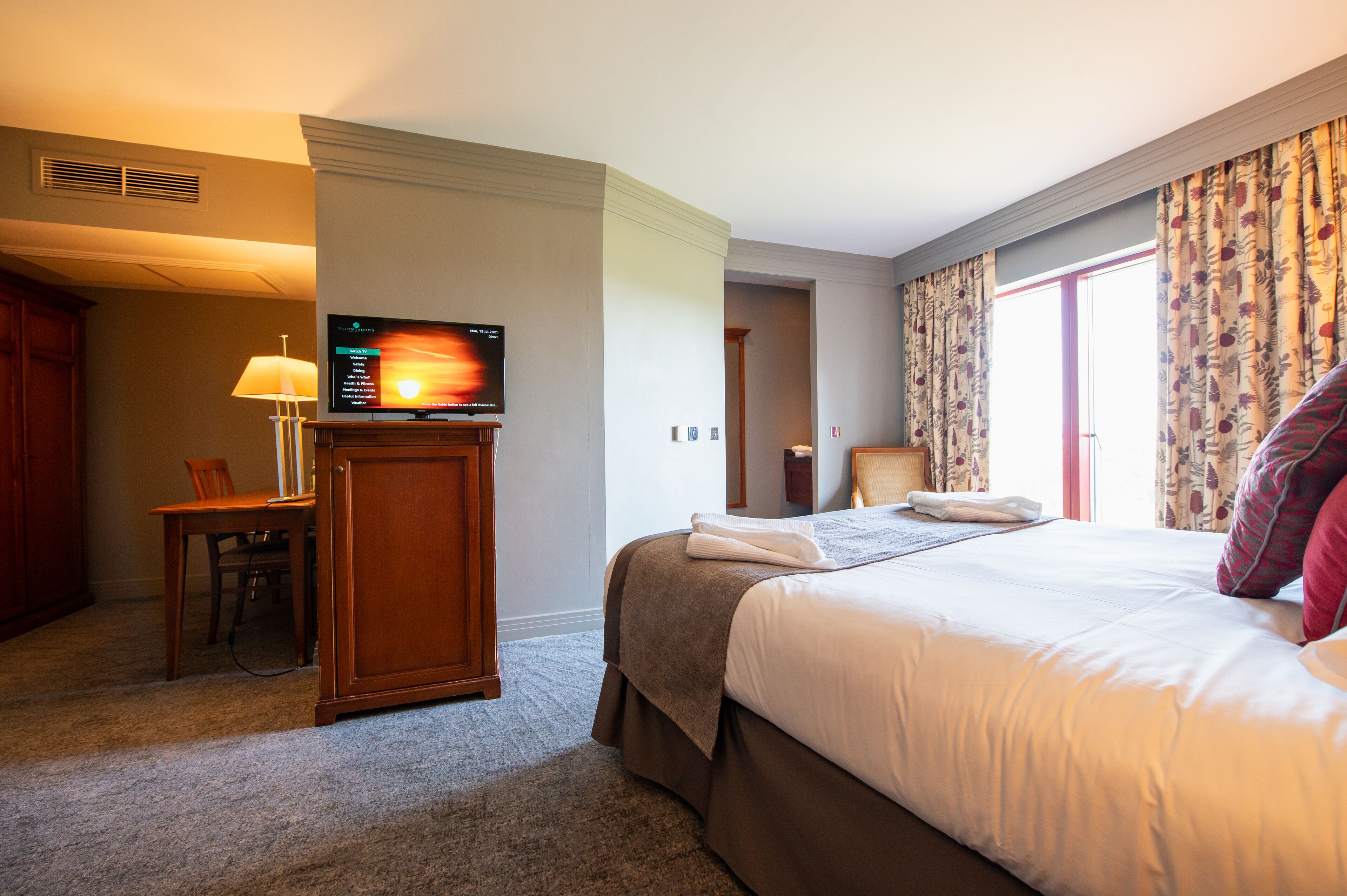 junior suite | in-room safe, desk, blackout curtains, soundproofing