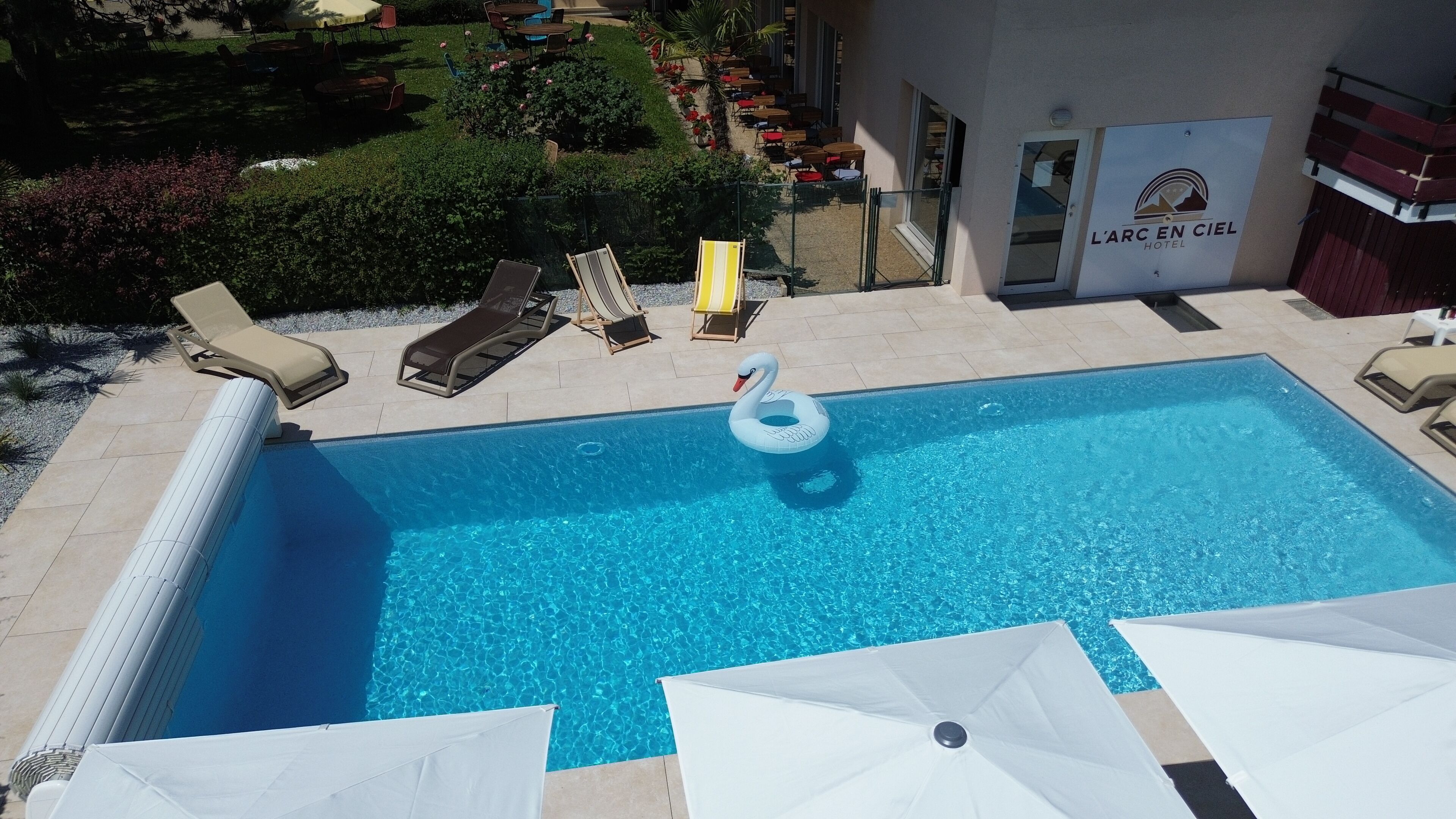 outdoor pool, open 10:00 am to 8:30 pm, pool loungers