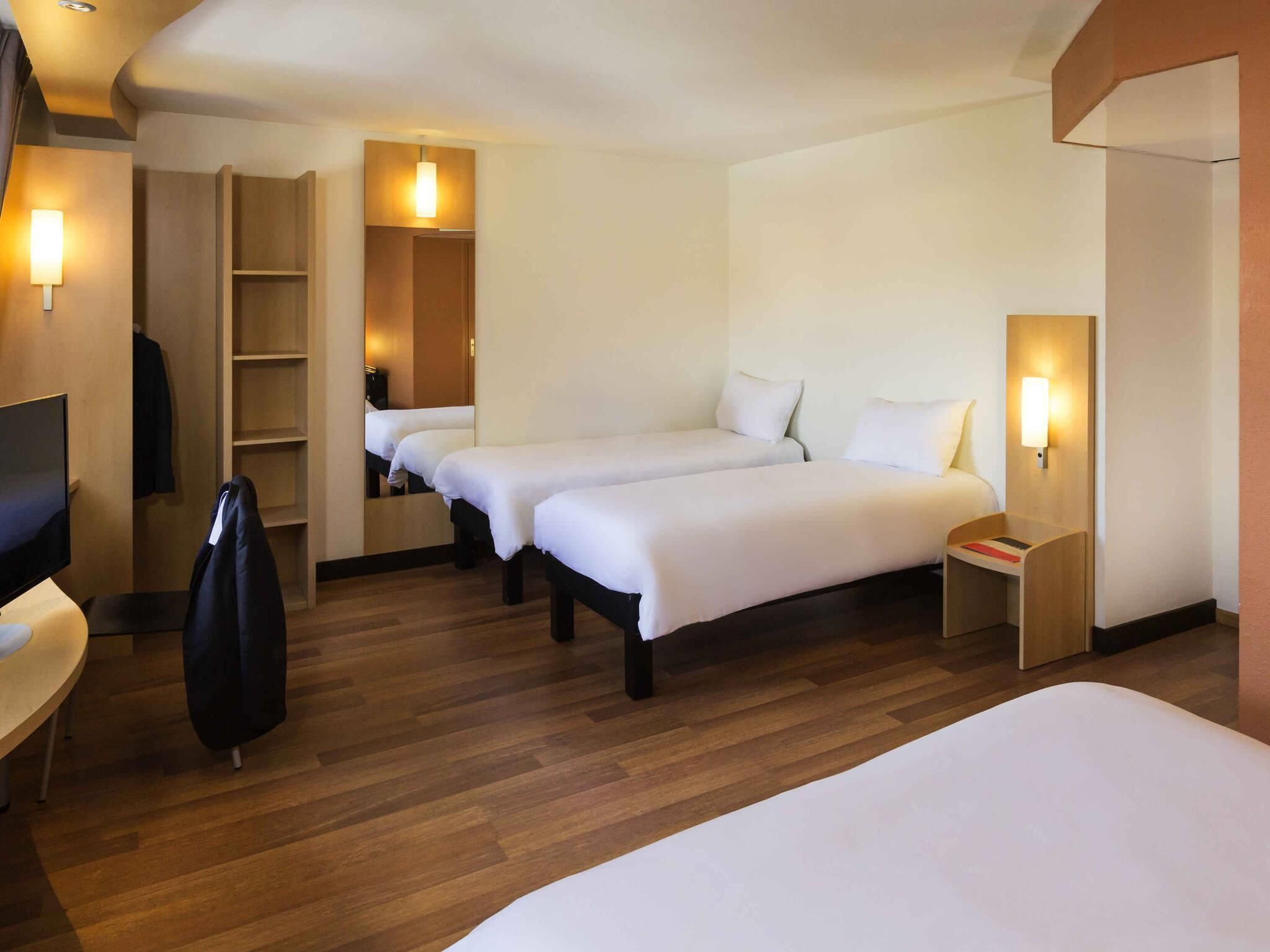 Standard Room, Multiple Beds | Premium bedding, in-room safe, desk, blackout drapes