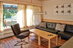 Bungalow, 2 chambres, sauna | Aire de séjour