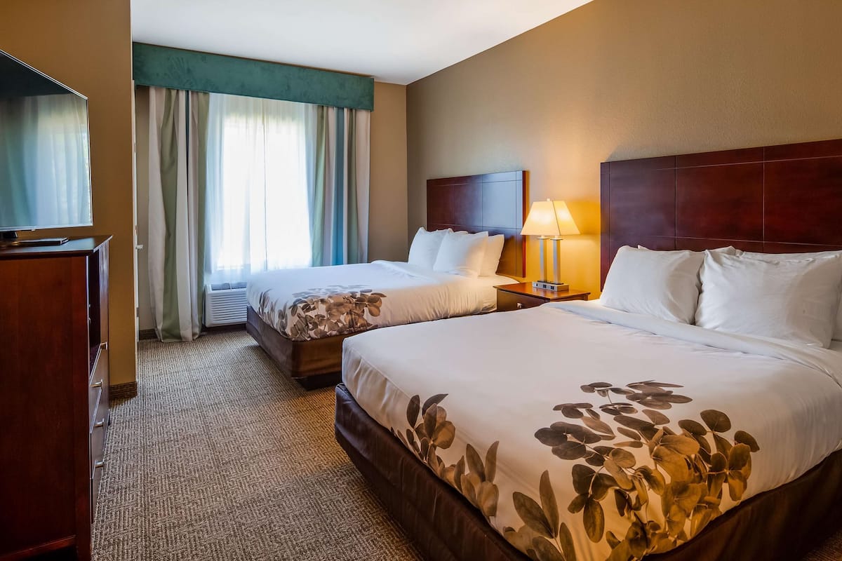 premium bedding, desk, laptop workspace, blackout curtains