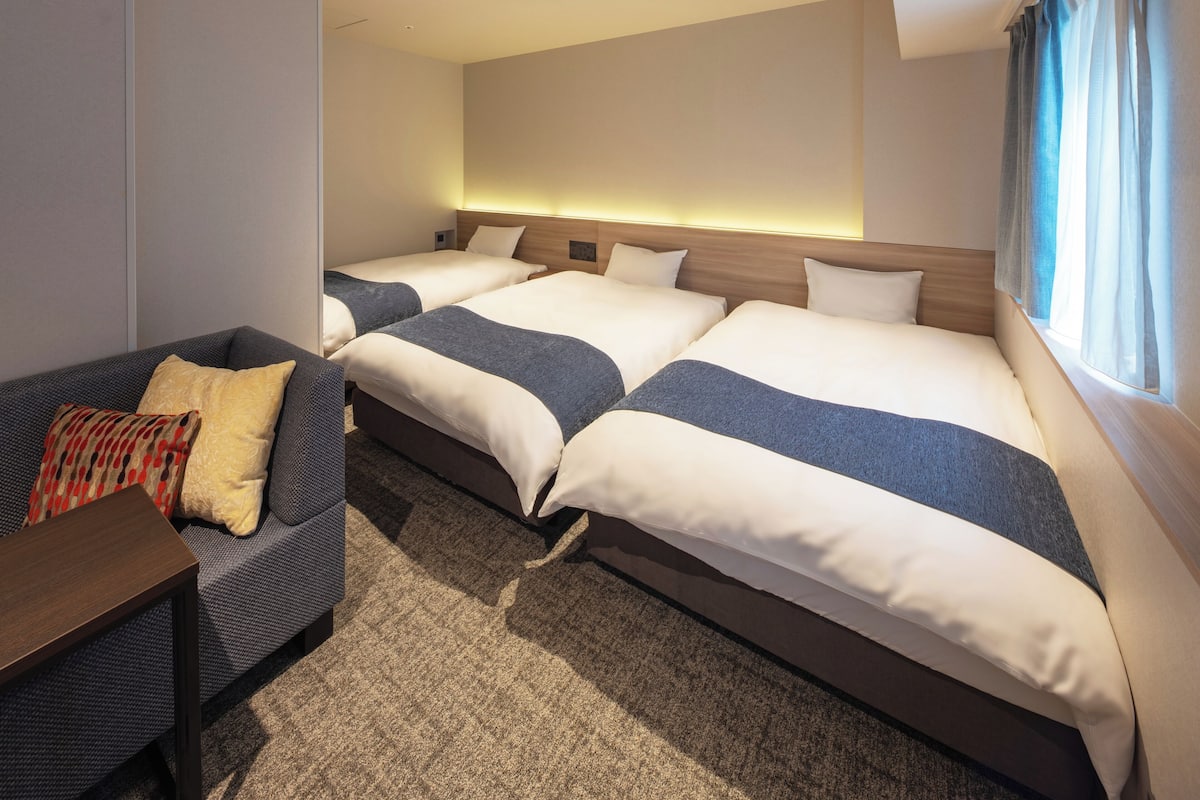 Kolmen hengen deluxe-huone | Ilmainen Wi-Fi, vuodevaatteet