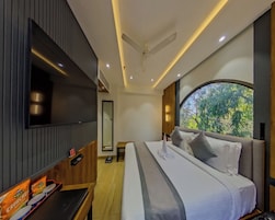 Ropa de cama de alta calidad, minibar y escritorio 