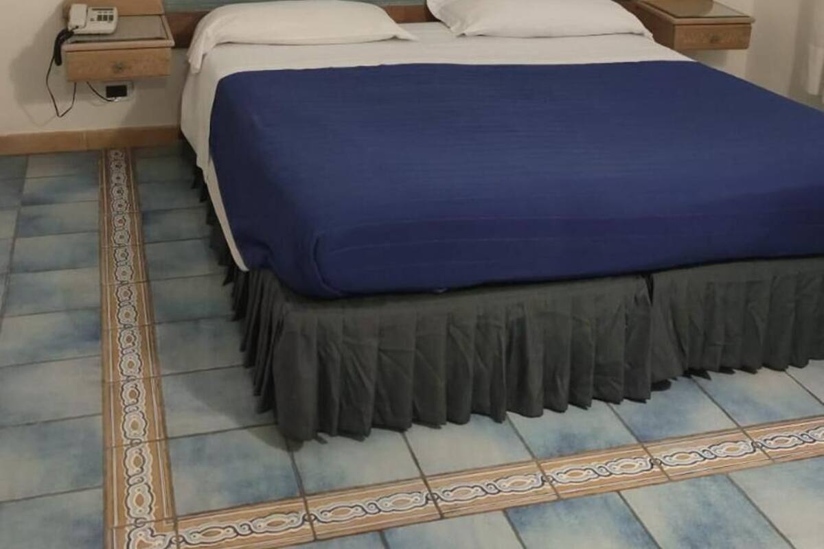 Economy Double Room | Premium bedding, minibar, in-room safe, desk