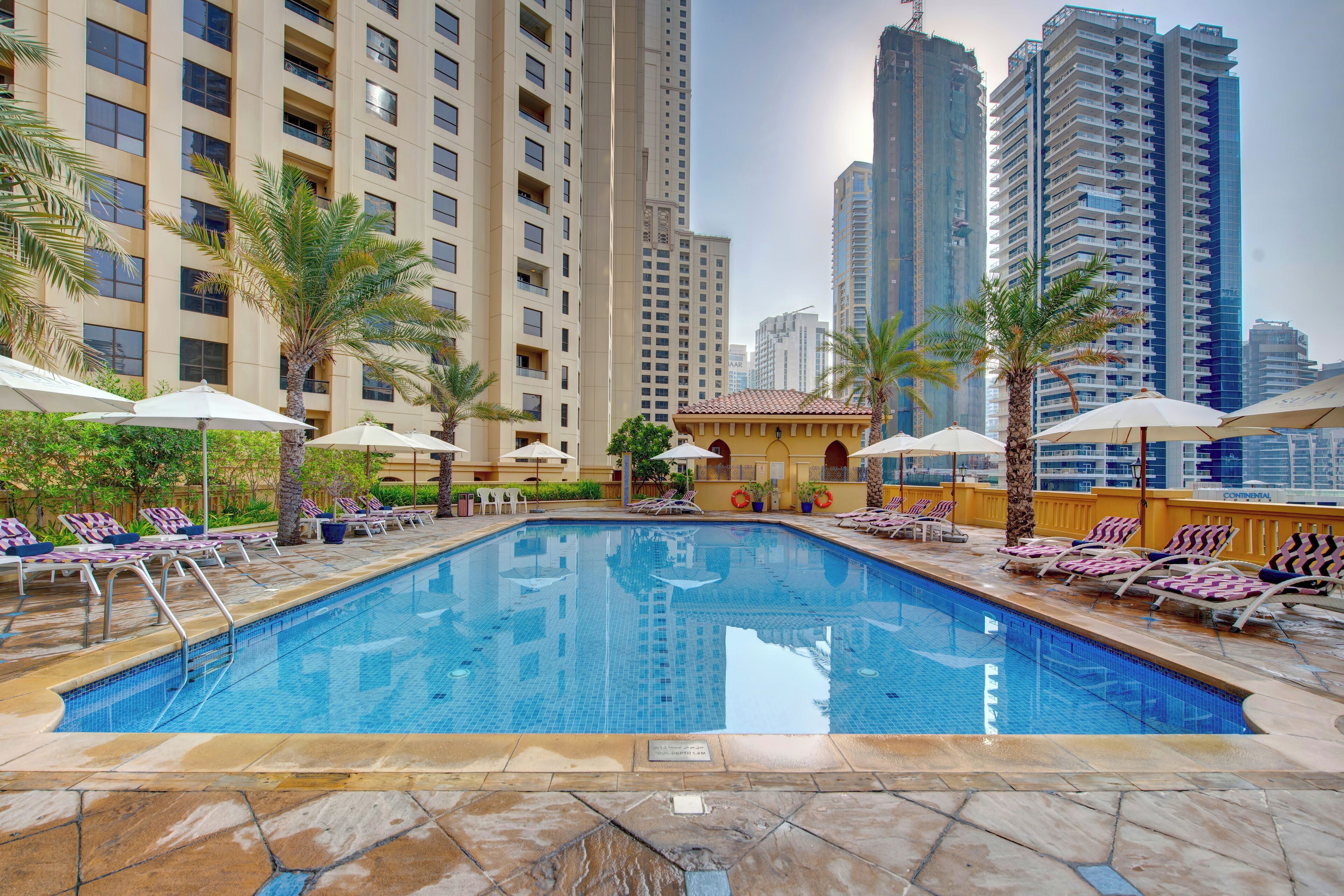 Outdoor pool, pool umbrellas, sun loungers