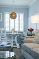 Deluxe Room | Living area | Flat-screen TV