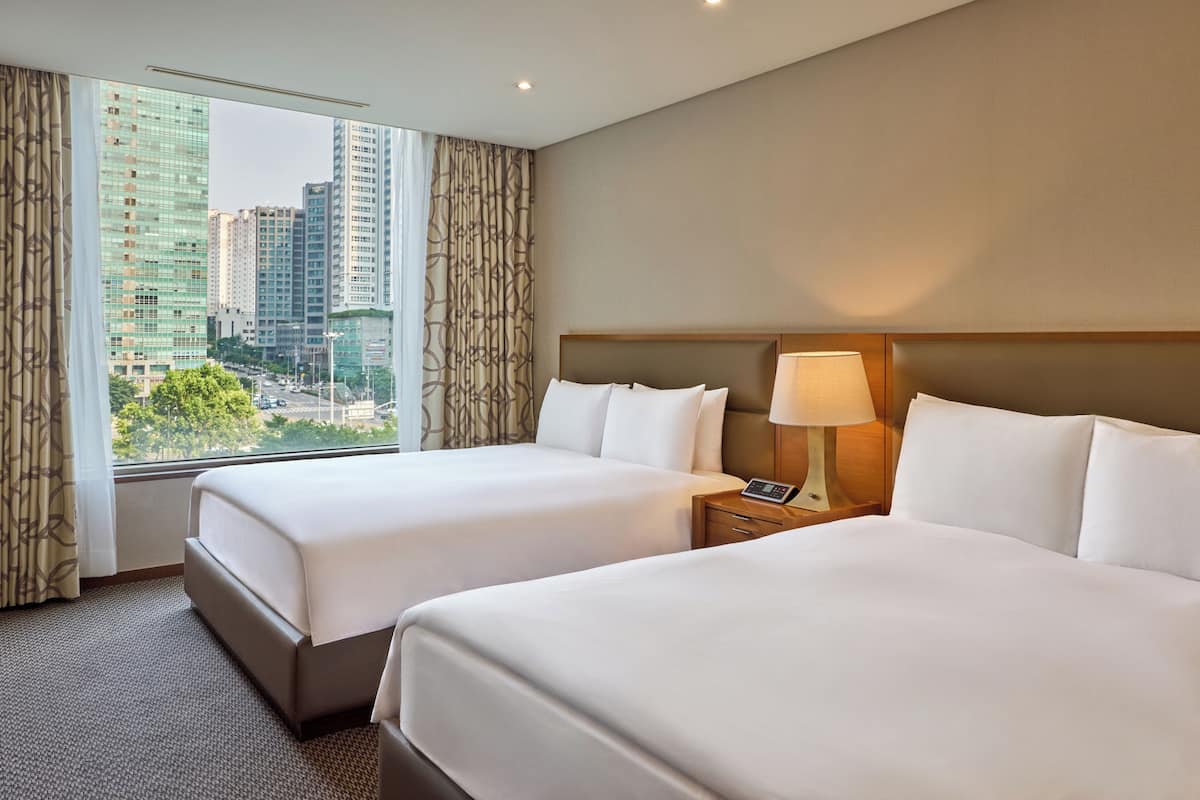 Deluxe Room, 2 Double Beds | Premium bedding, down duvets, pillow-top beds, in-room safe