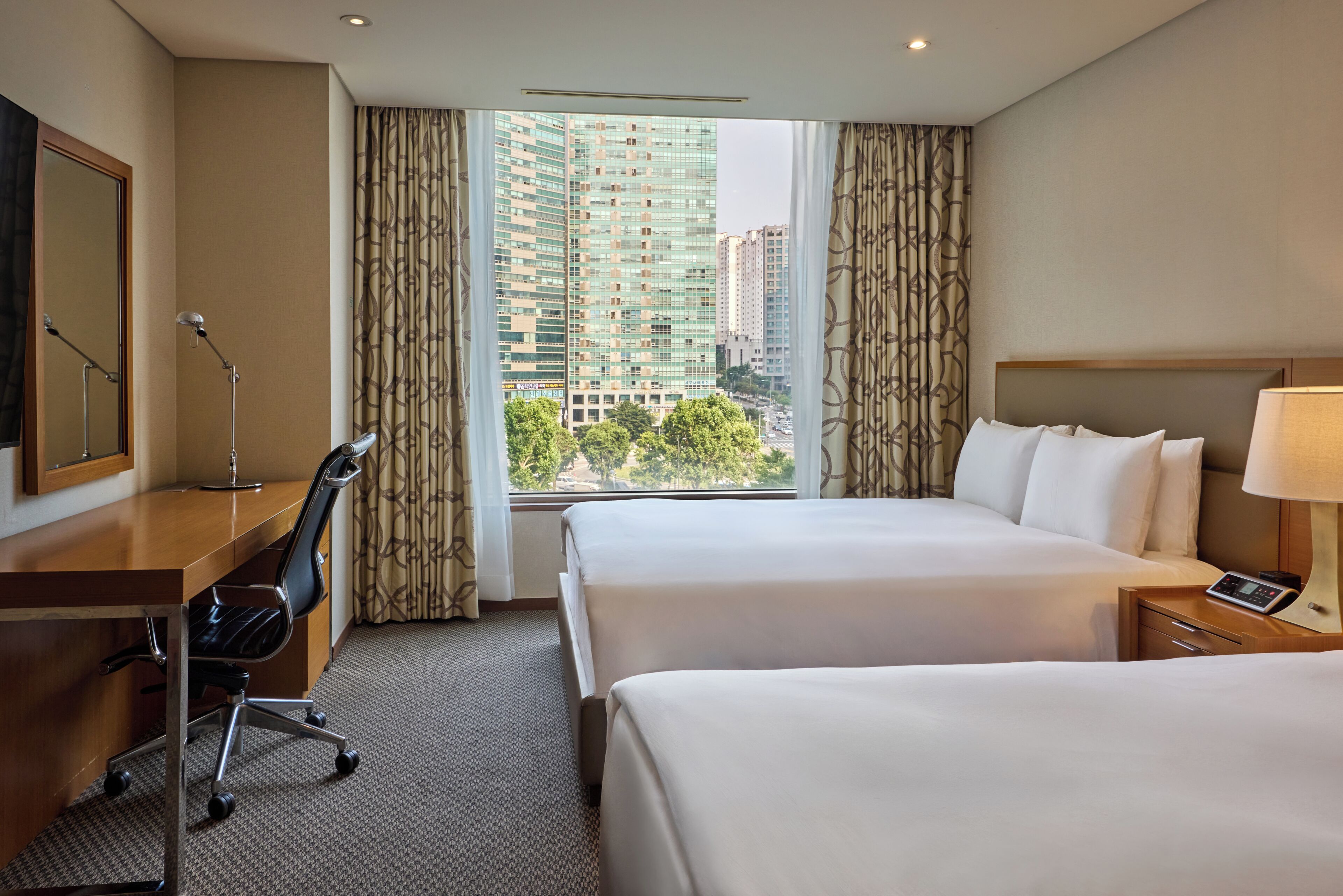Deluxe Room, 2 Double Beds | Premium bedding, down duvets, pillow-top beds, in-room safe