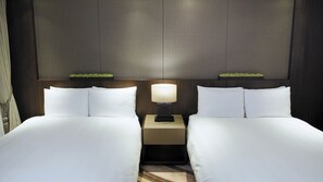 Premium bedding, down comforters, pillowtop beds, in-room safe