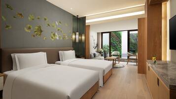 Ropa de cama de alta calidad, minibar, caja fuerte y escritorio