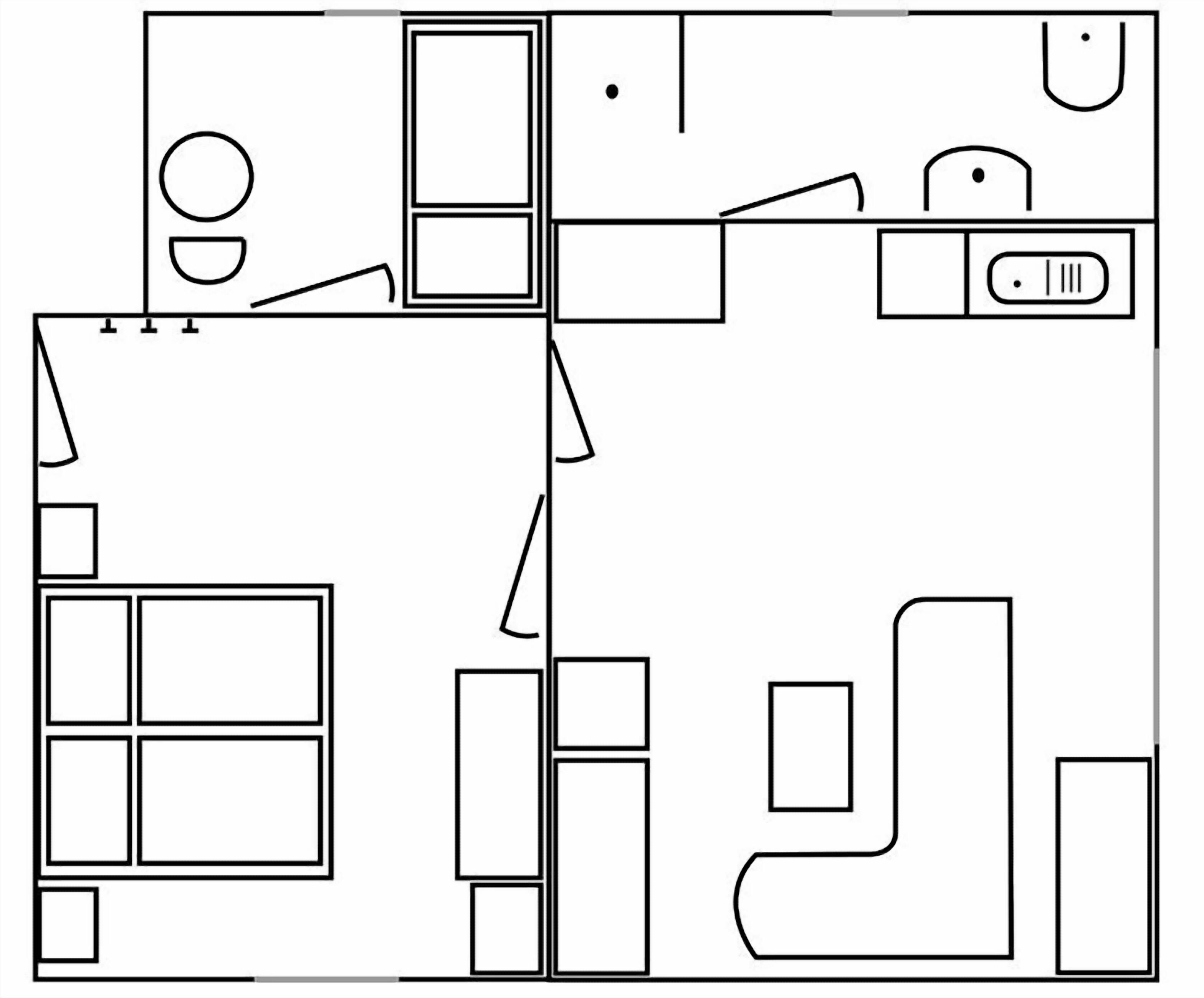 A floor plan with a kitchen area, a dining space, and a living area.