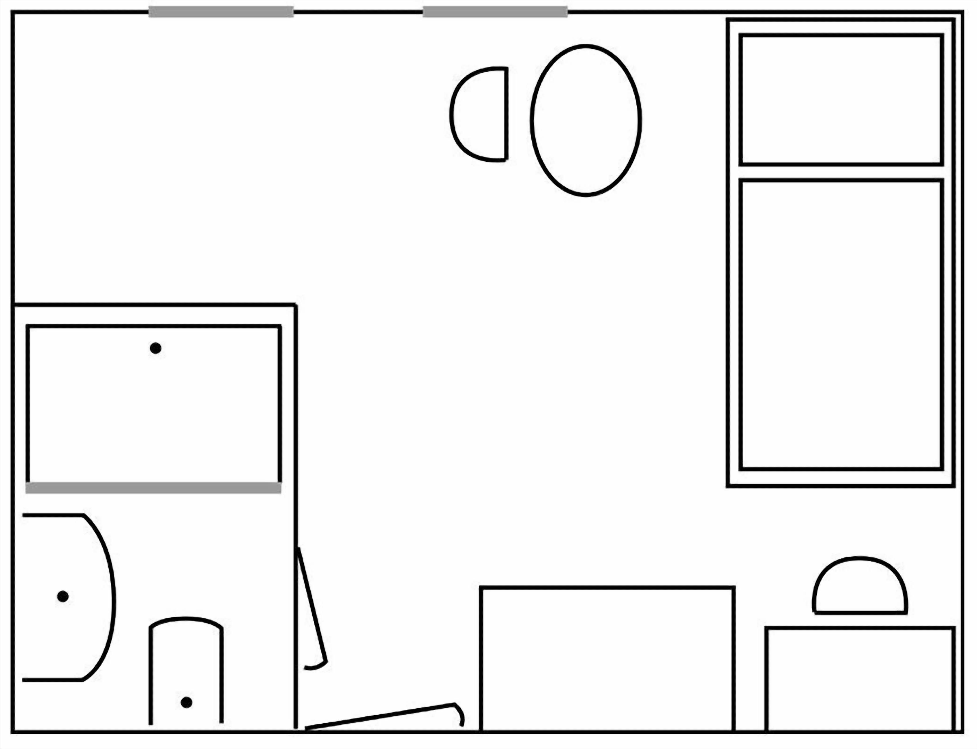 Een plattegrond met een keuken, een eetruimte en twee slaapkamers.