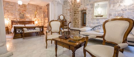Luxury Suite | Minibar, in-room safe, individually decorated, individually furnished