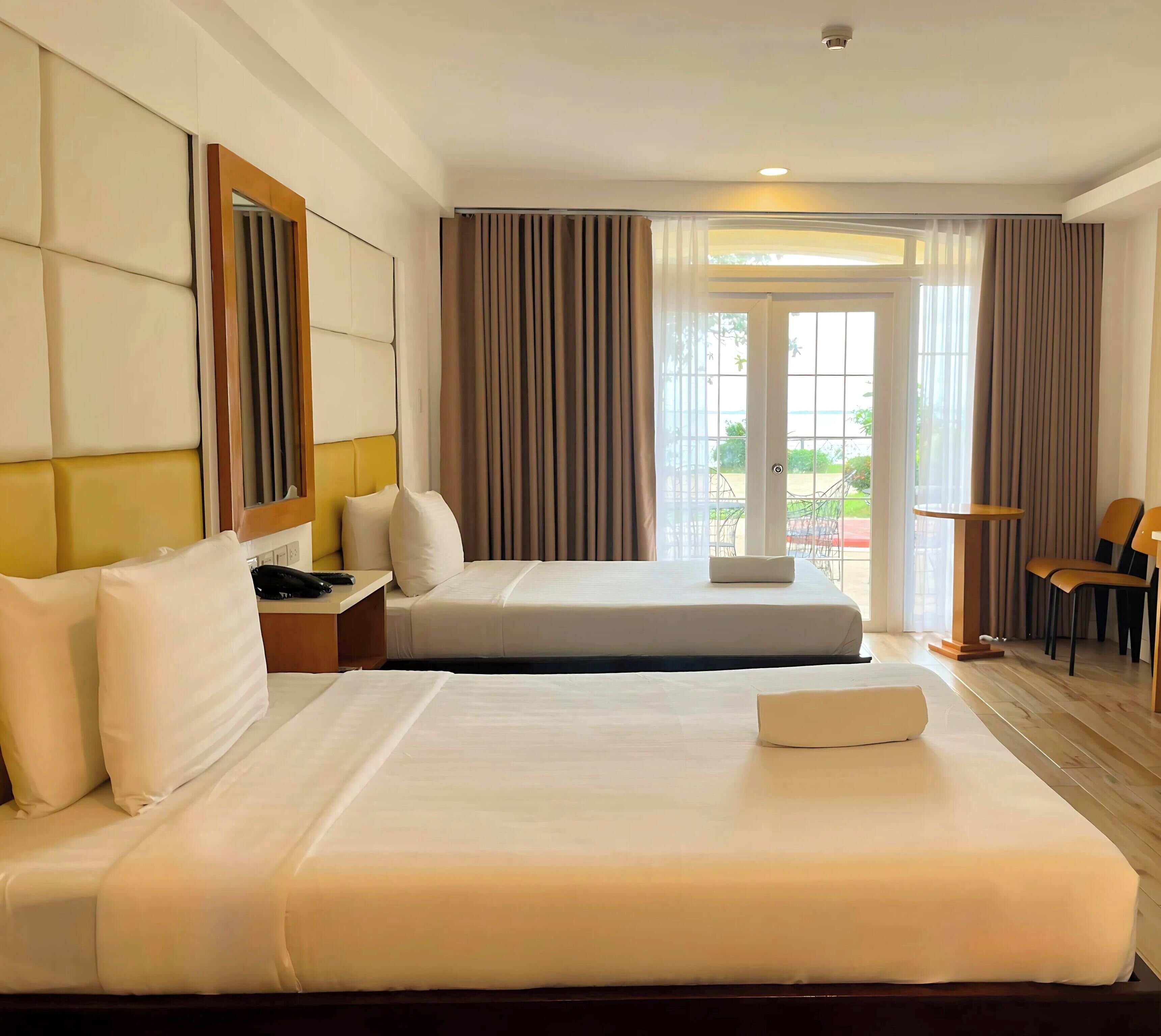 Camera Premier con 2 letti singoli | Una cassaforte in camera, Wi-Fi gratuito, lenzuola