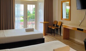 Camera Premier con 2 letti singoli | Una cassaforte in camera, Wi-Fi gratuito, lenzuola