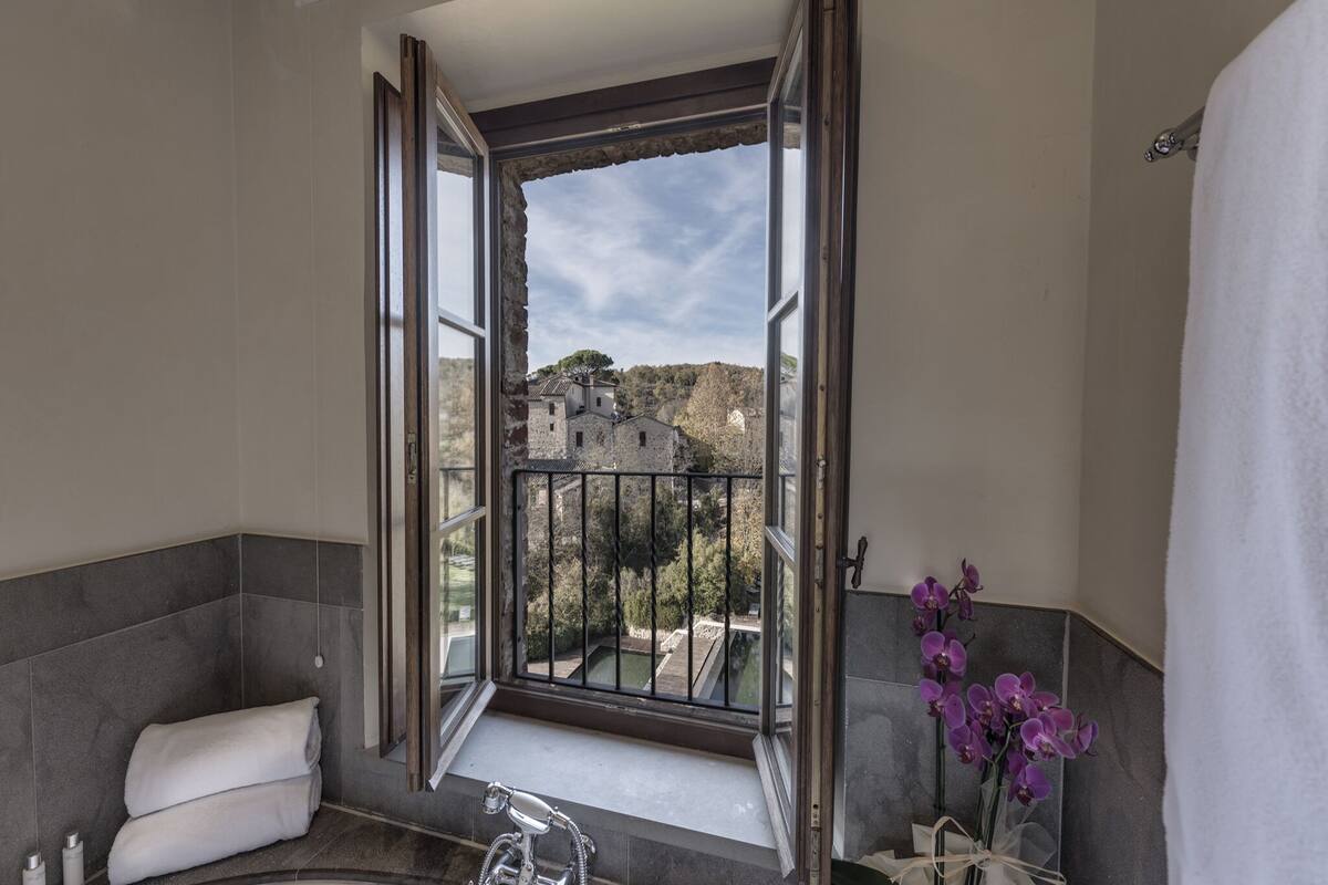 junior suite | bathroom | designer toiletries, hair dryer, bathrobes, slippers