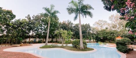 4 outdoor pools, open 8:00 AM to 5:00 PM, free cabanas, sun loungers