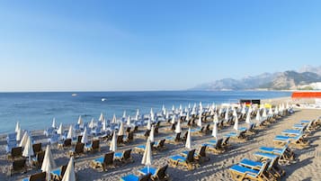 Beach nearby, black sand, sun-loungers, beach umbrellas