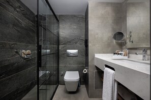 Suite, Sea View | Bathroom | Shower, free toiletries, hair dryer, slippers