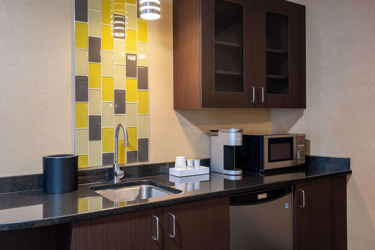 premium bedding, desk, laptop workspace, blackout curtains