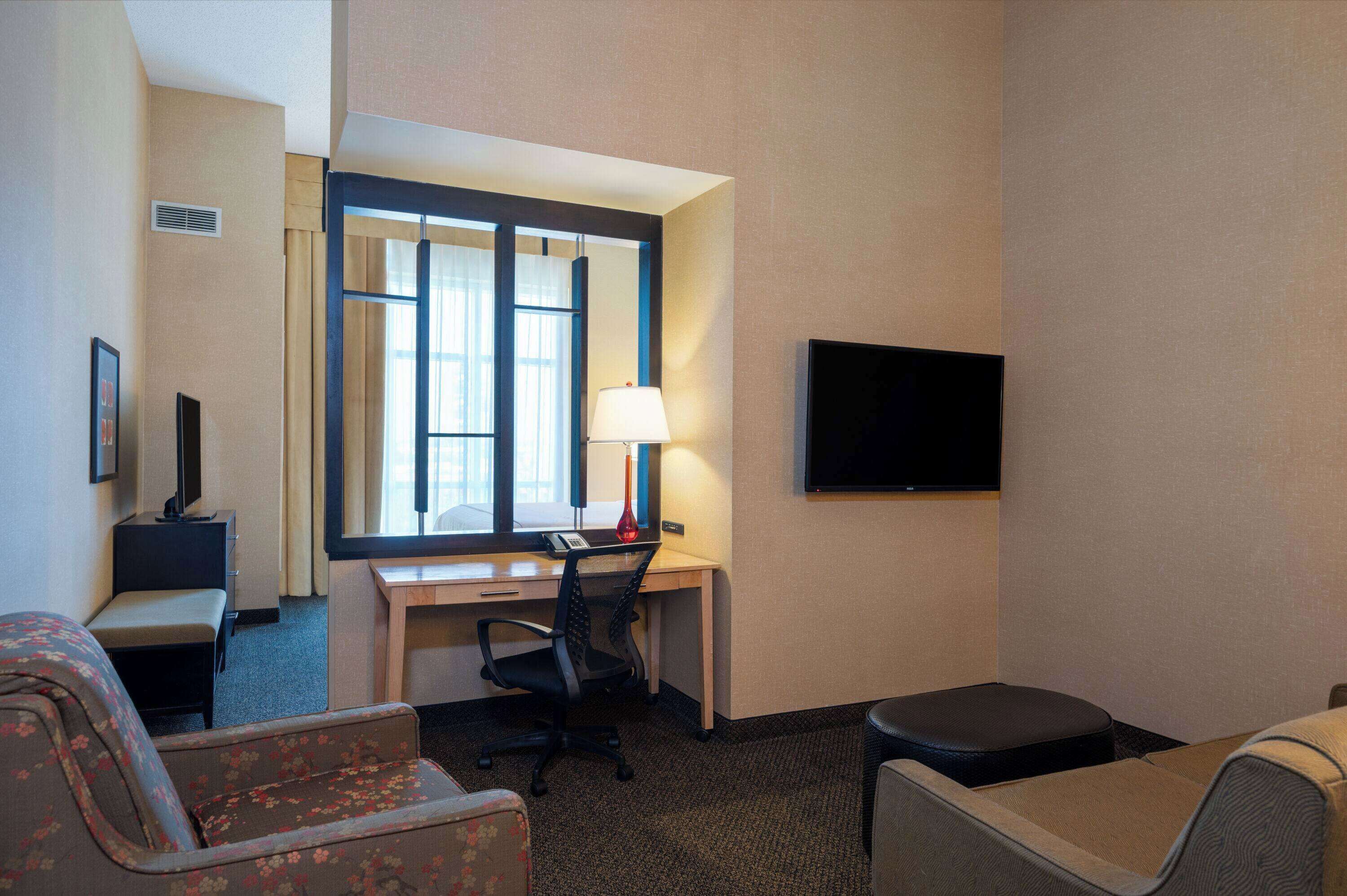 premium bedding, desk, laptop workspace, blackout curtains