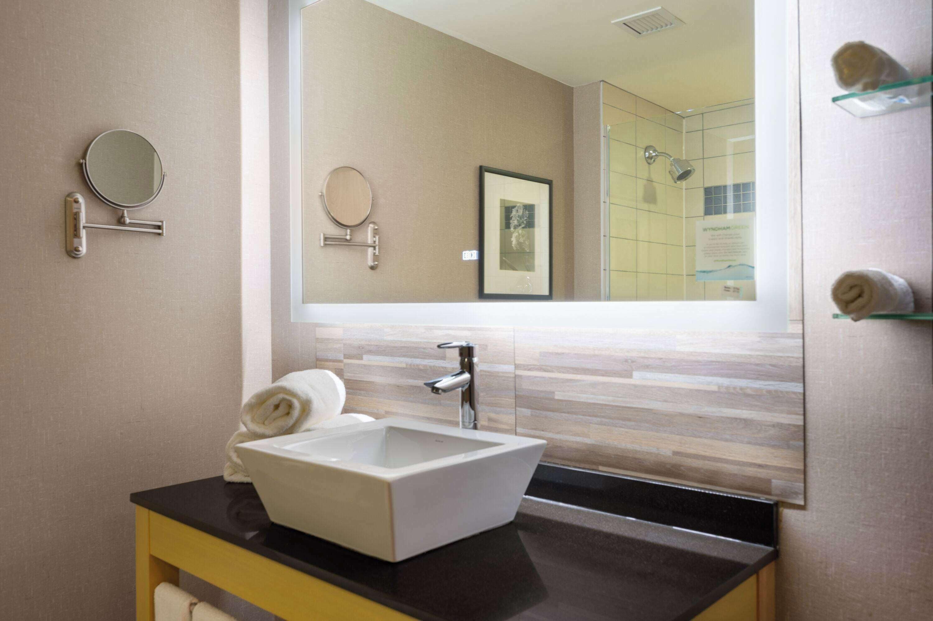 premium bedding, desk, laptop workspace, blackout curtains