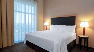 Suite, 1 King Bed, Non Smoking (Mobility/Hearing, Roll-In Shower) | Premium bedding, desk, laptop workspace, blackout drapes