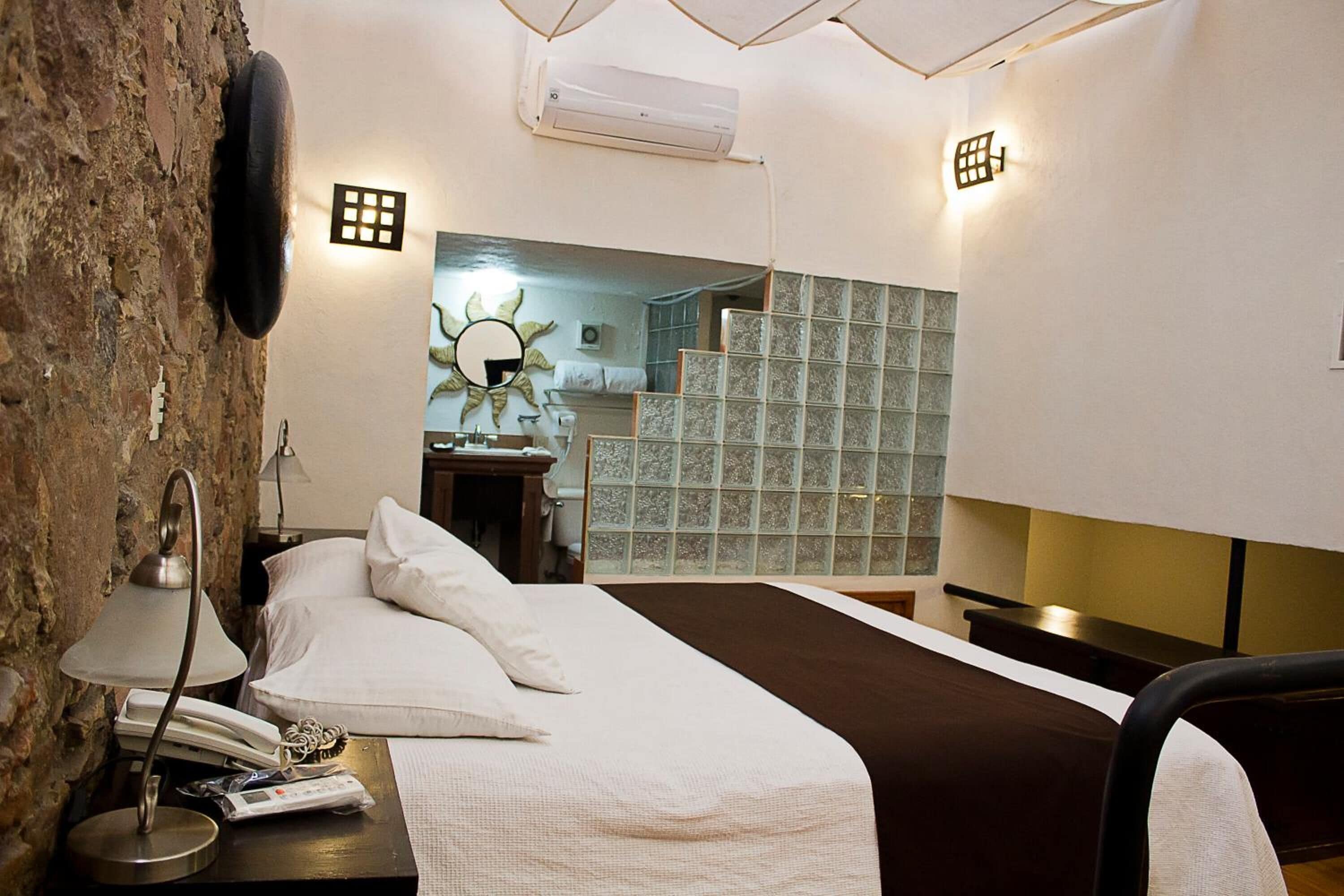 Egyptian cotton sheets, premium bedding, down duvets, minibar