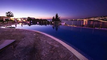 Indoor pool, seasonal outdoor pool, pool umbrellas