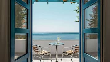 Bungalow, vista al mar | Artículos del minibar gratis y caja de seguridad en la habitación