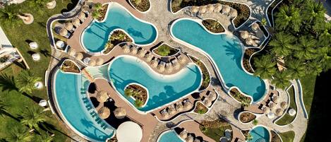 7 outdoor pools, pool umbrellas, pool loungers