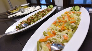 A buffet table with various dishes including salads and vegetables. - Hotel Pine Valley (Fethiye)