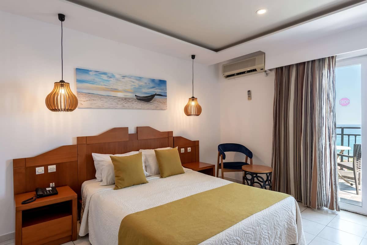 Standard Double or Twin Room, Partial Sea View | 1 bedroom, blackout curtains, WiFi, bed sheets
