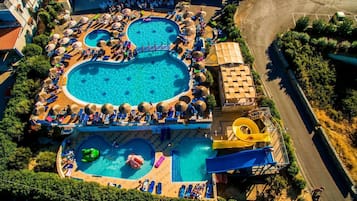 2 outdoor pools, pool umbrellas, pool loungers