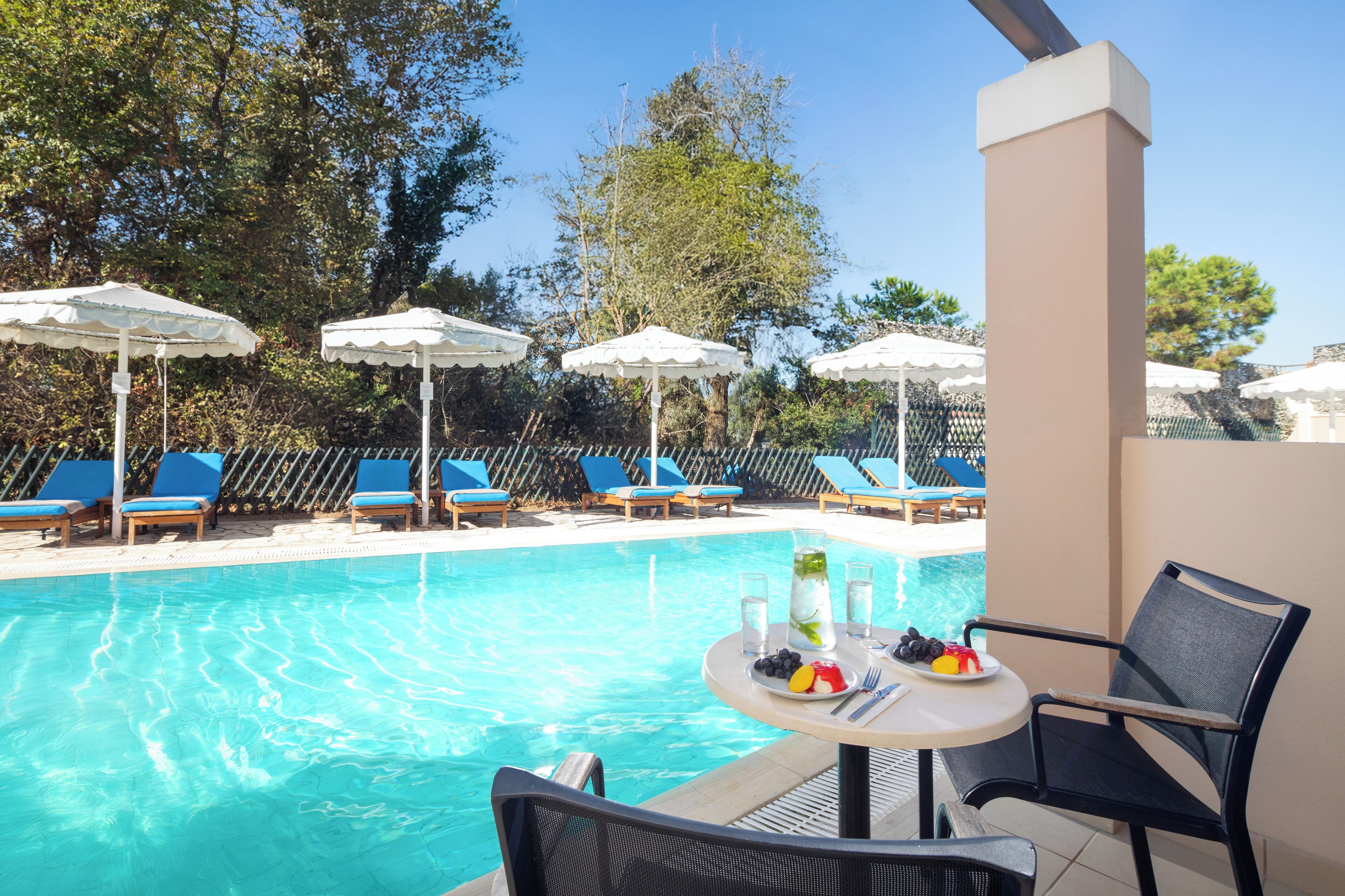 Double or Twin Room (Sharing Pool) | Free minibar, in-room safe, desk, blackout curtains