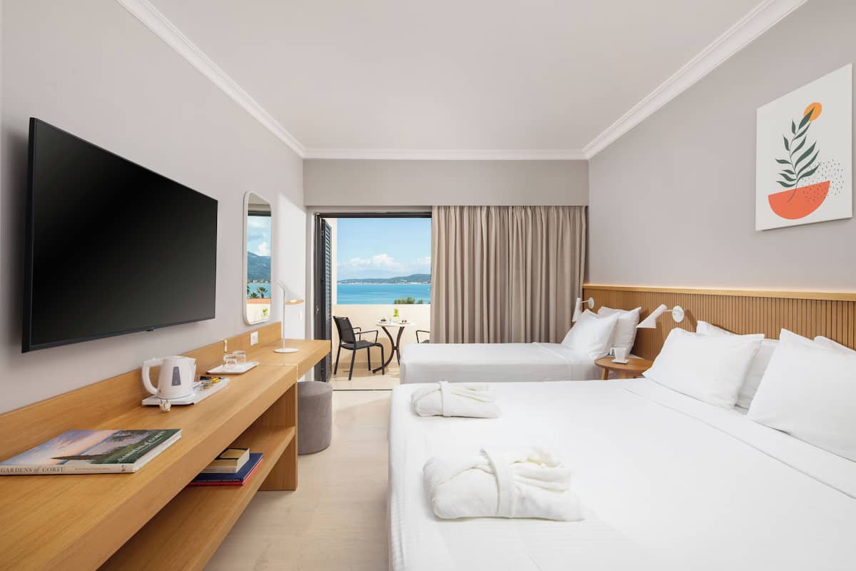 Double or Twin Room, Sea View | Free minibar, in-room safe, desk, blackout drapes