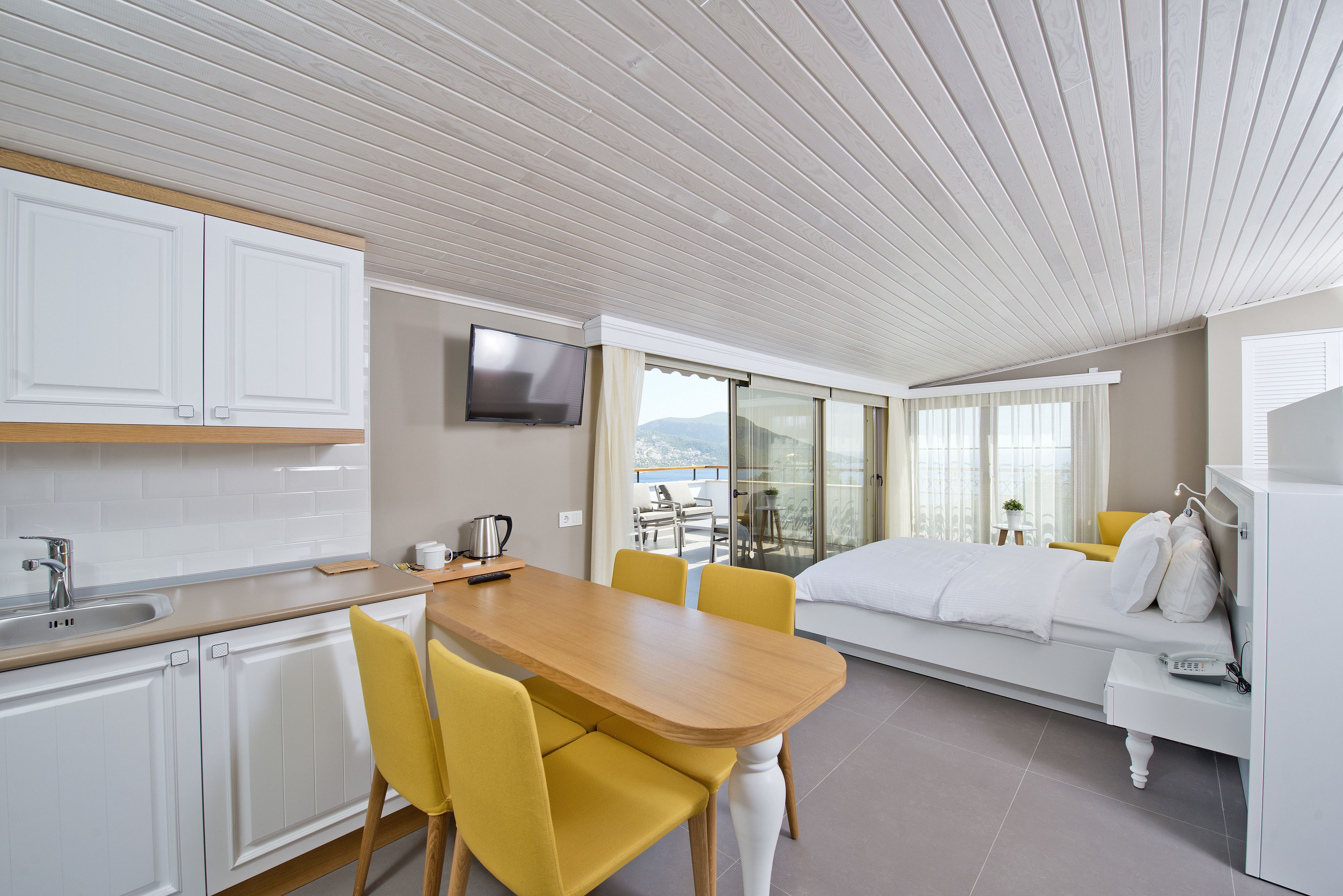 penthouse suite with sea and pool view | premium bedding, down duvets, select comfort beds, minibar
