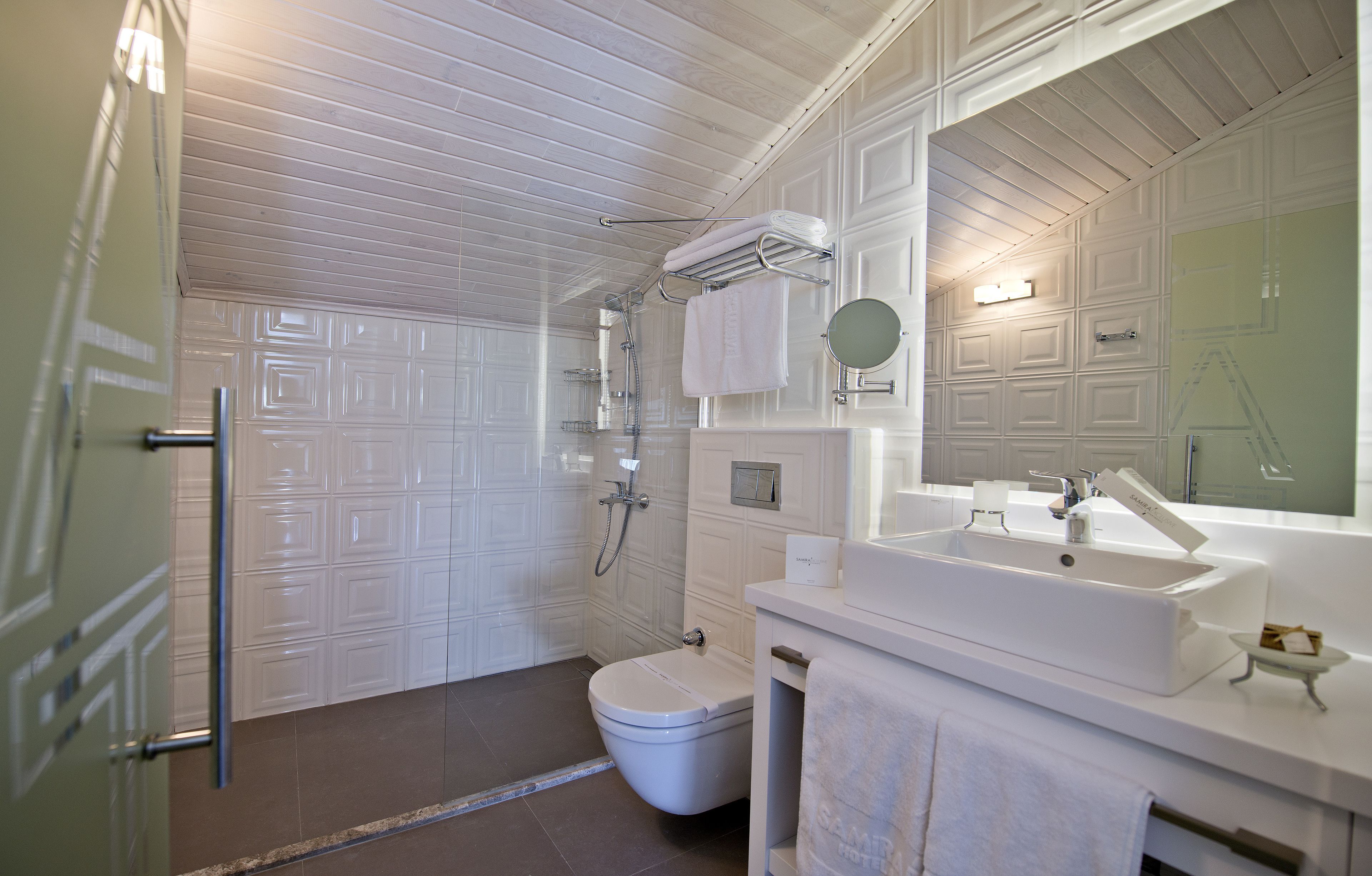penthouse suite with sea and pool view | bathroom | designer toiletries, hair dryer, towels
